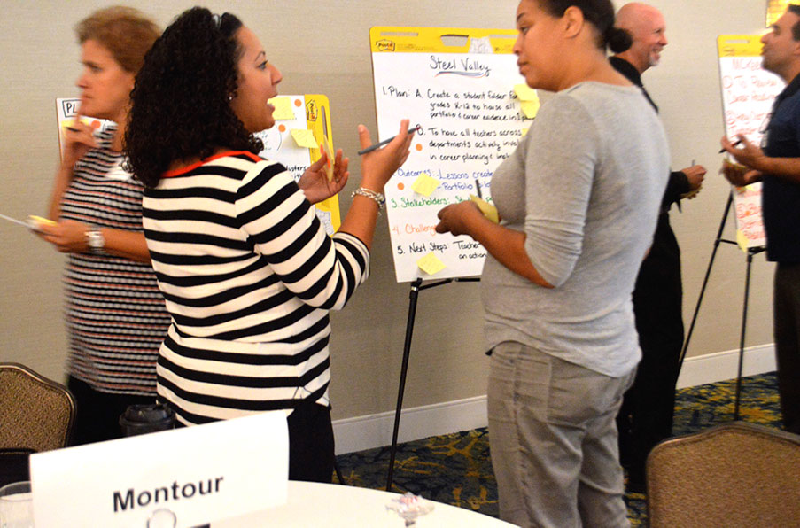 Teachers engaged in conversation